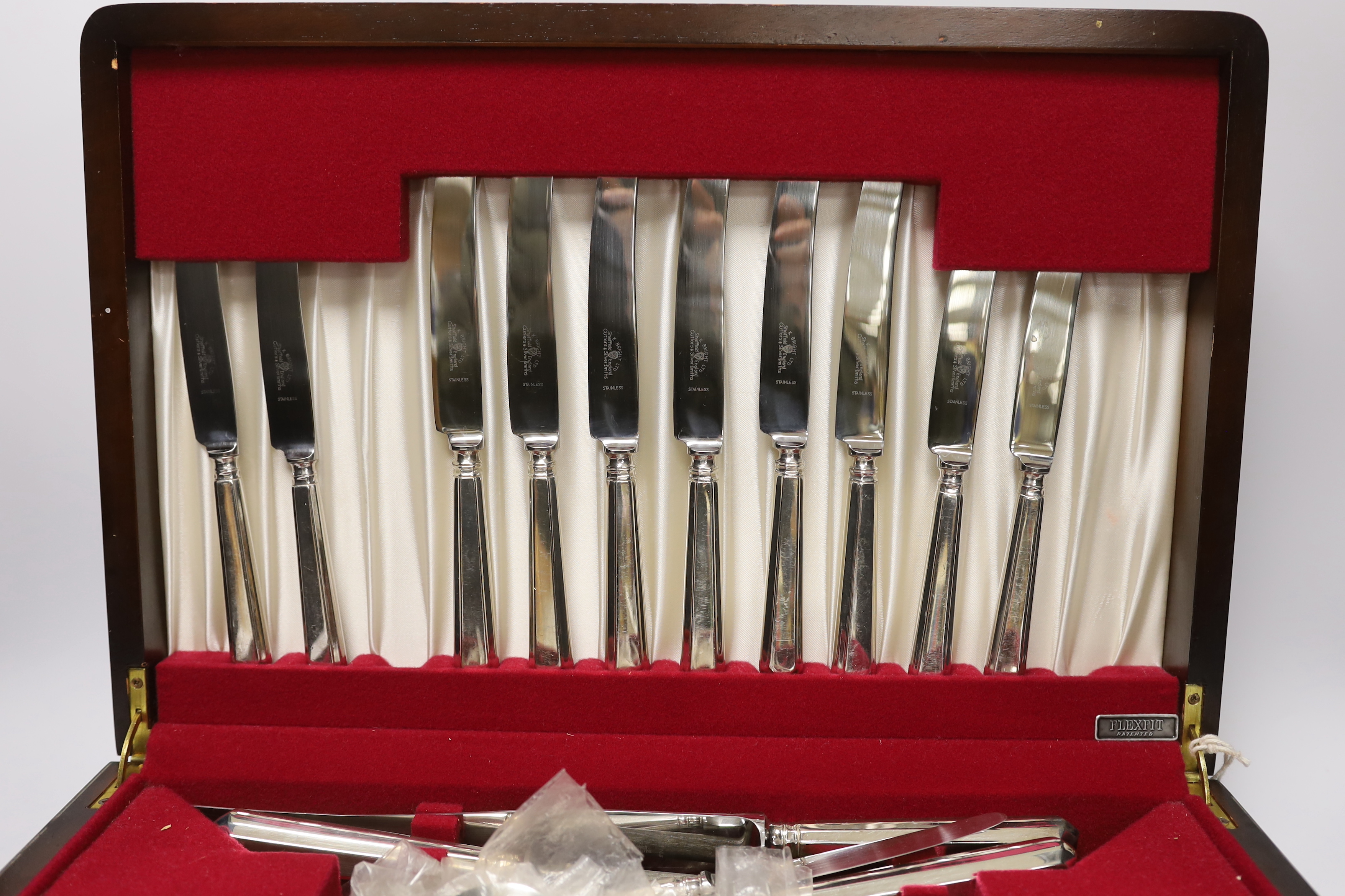 A canteen of silver plated cutlery, 47cm wide